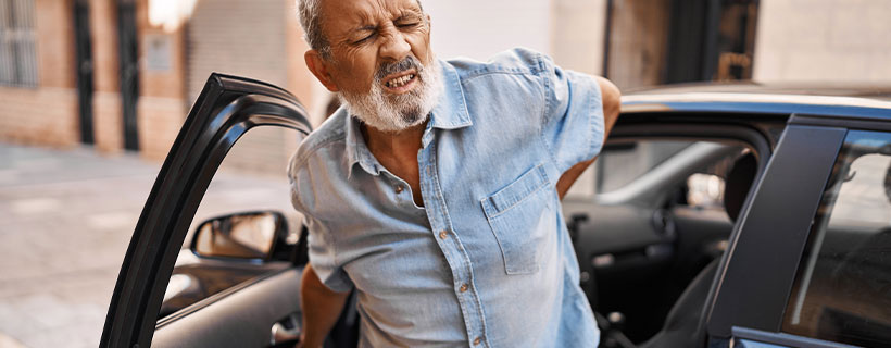 Patient suffering from Back Pain in need of auto accident injury care in Cumming